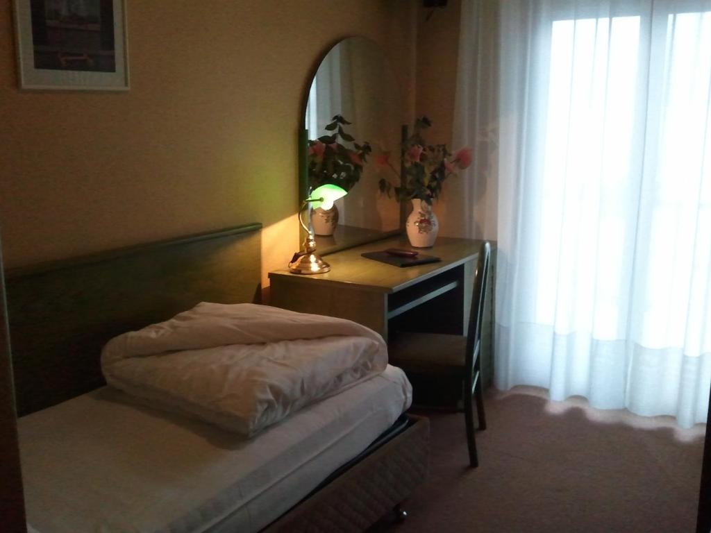 Hotel Caribe - Garda Lake Collection เบรนโซเน ซูล การ์ดา ห้อง รูปภาพ
